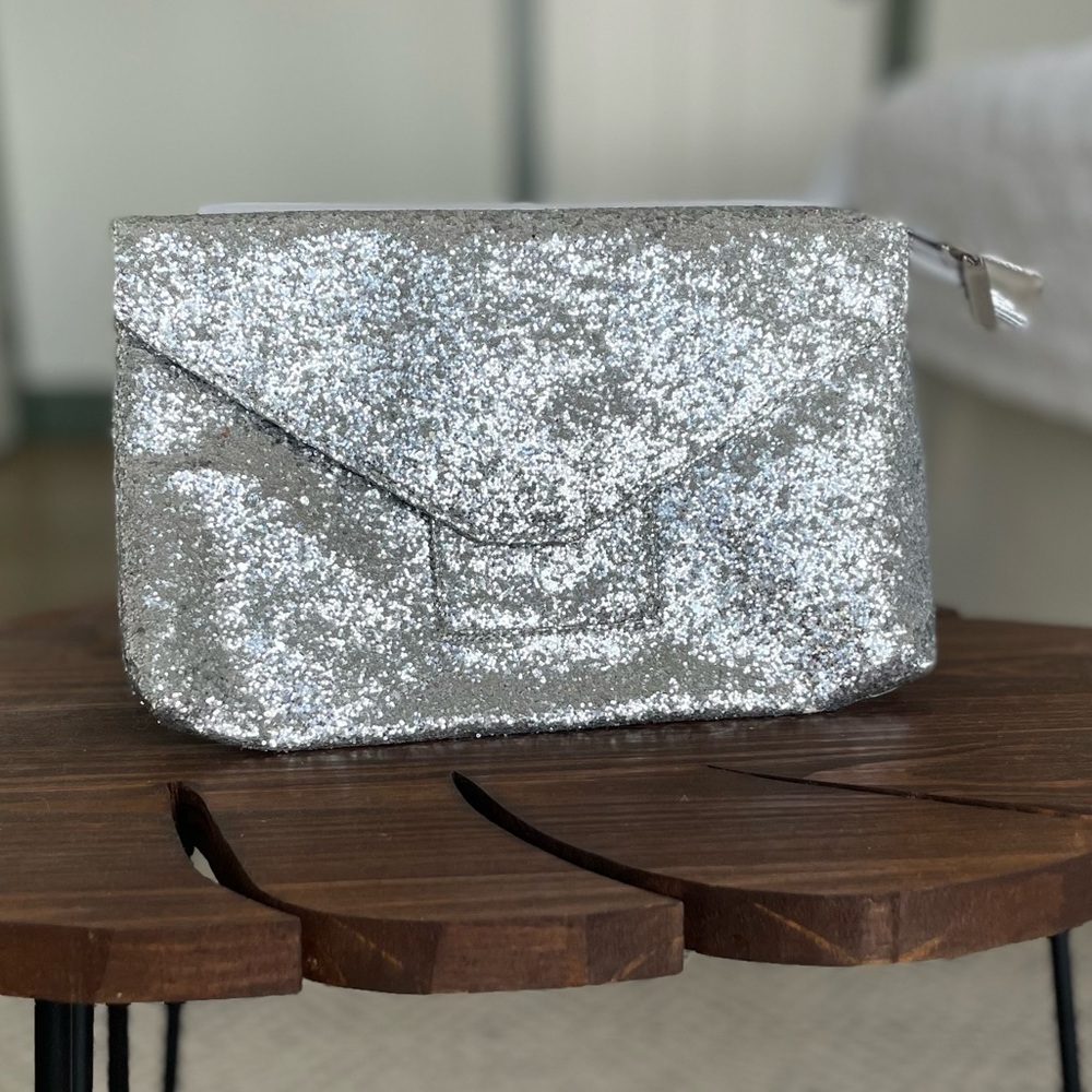 Aldo sparkle envelope clutch.
